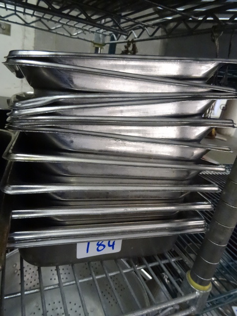 lot 184 image: 13 shallow half pans....