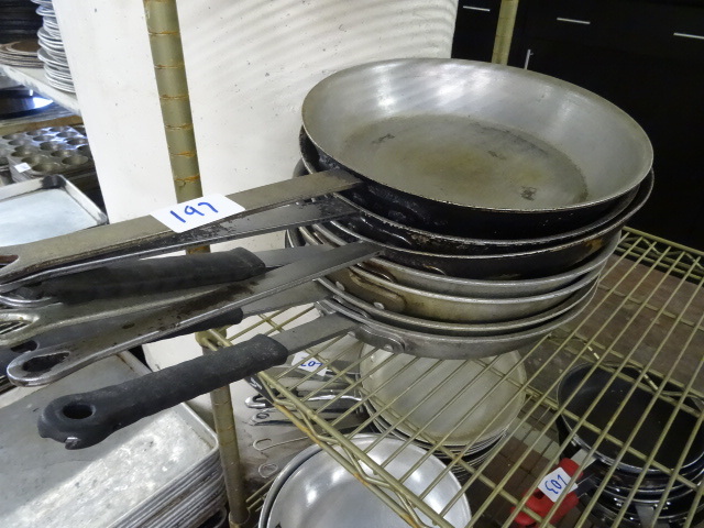lot 197 image: 7 skillets. 15...
