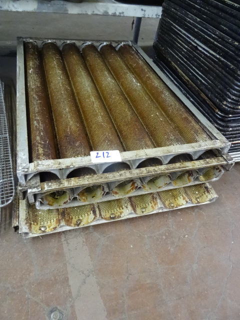lot 212 image: French loaf baking pans...
