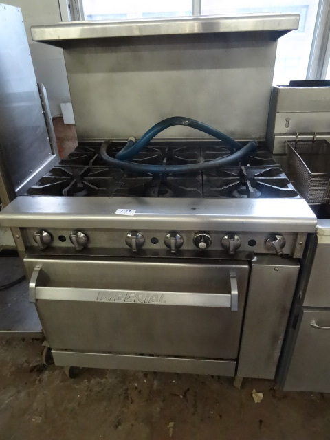 lot 272 image: Imperial natural gas stove. 6 burne...