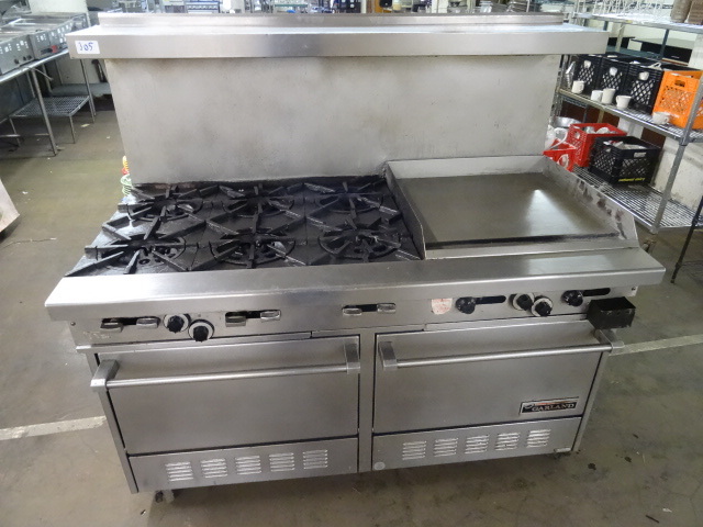 lot 305 image: Garland natural gas stove. 6 burner...