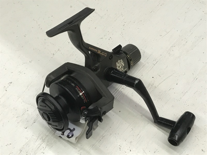 lot 82 image: Shimano 300Q Spinning Reel ...