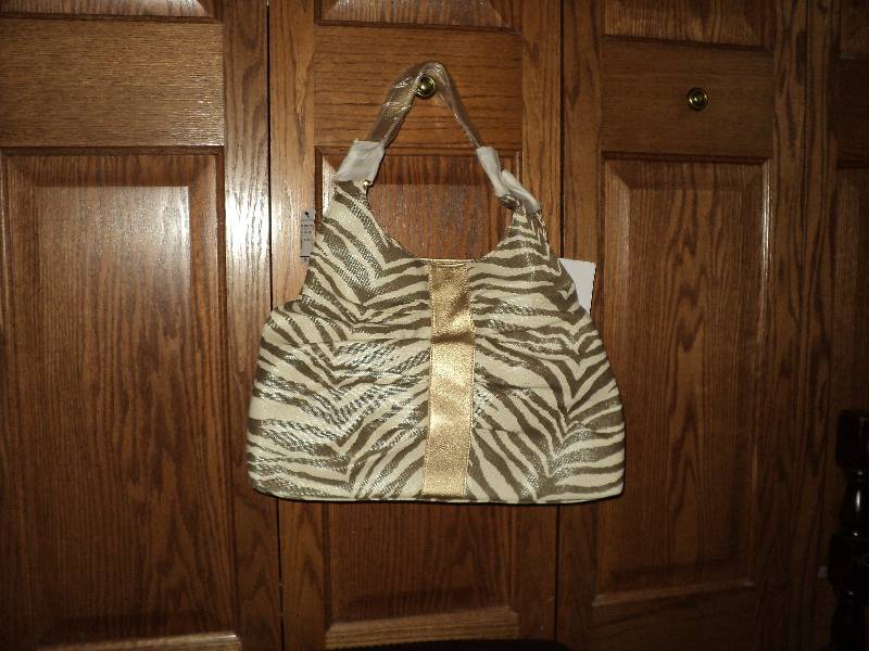 2 brand new purses...