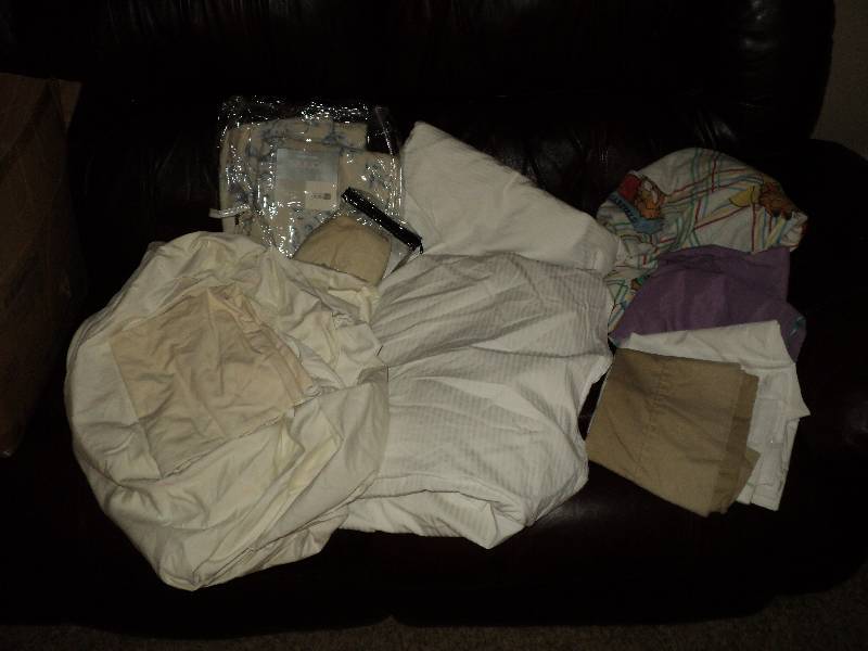 box of misc. sheets and pillow case...
