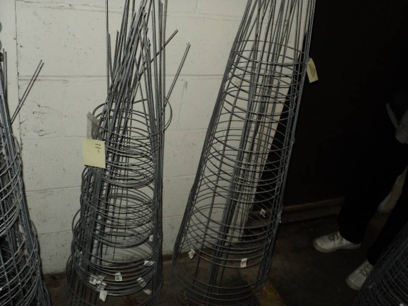 7 large tomato cages, 11 small toma...