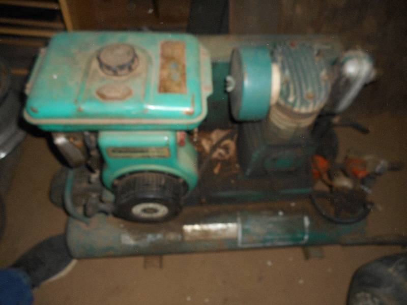 PORTABLE GAS POWERED AIR COMPRESSOR.