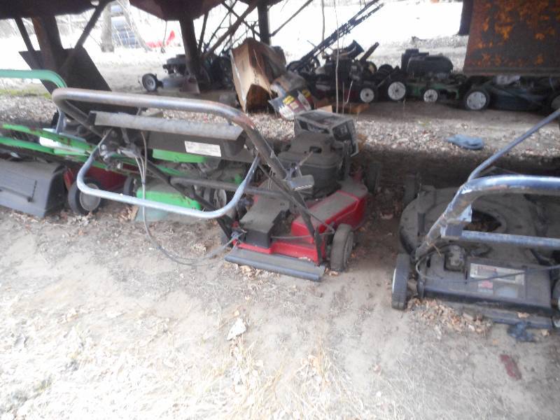 MASSIVE PILE OF LAWNMOWERS