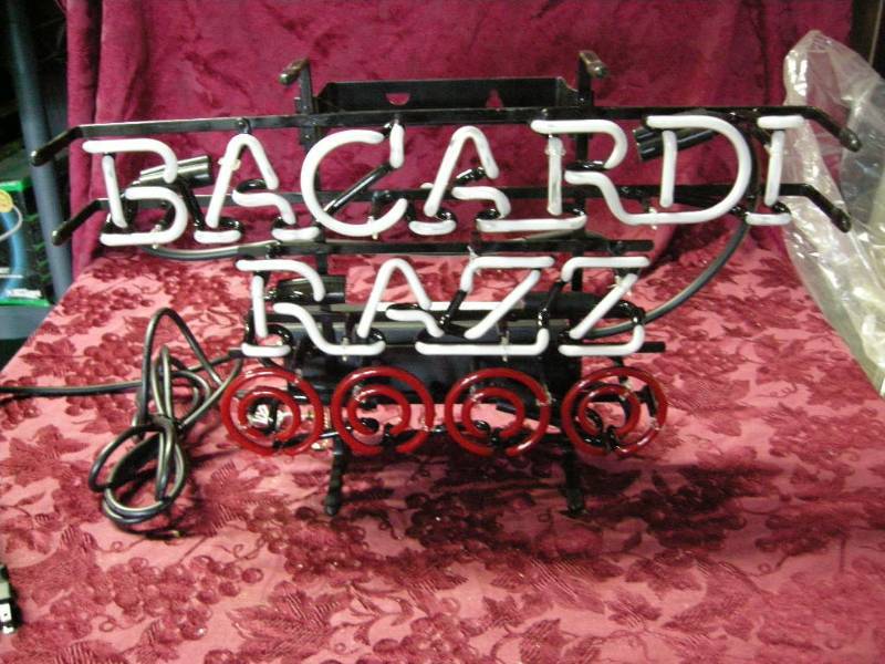 lot 71 image: Bacardi Razz Neon Sign