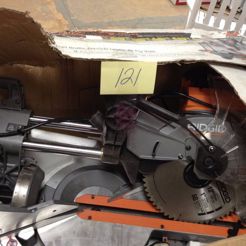 lot 121 image: Ridgid 12 inDual Bevel Sliding  Miter Saw used in very good condition