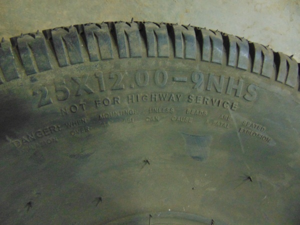 lot 36 image: Turf Trac 25x12.00-9 Tire