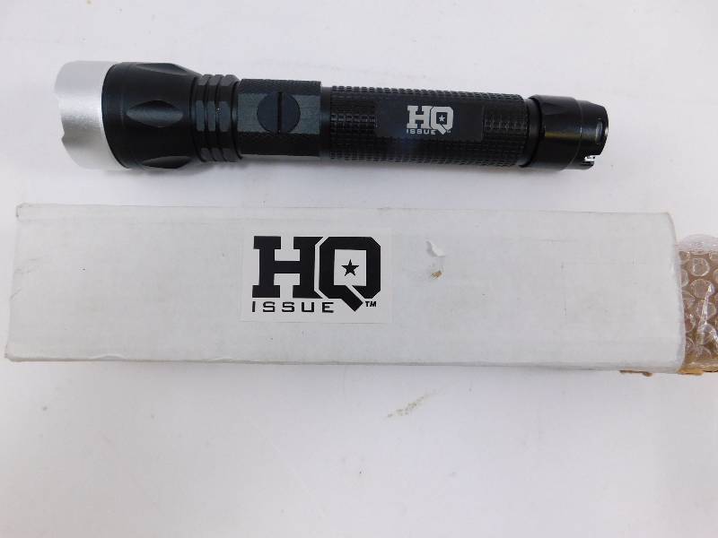 lot 8 image: HQ Issue 750 Lumen Indestructible Pro Series Flashlight