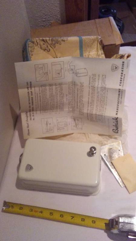 Vintage New Old Stock-  Soap Dispenser by Bobrick, wrapped in newspaper from 1951