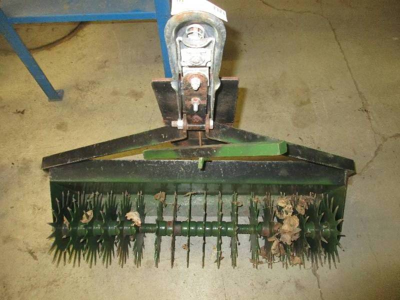 Pull behind aerator