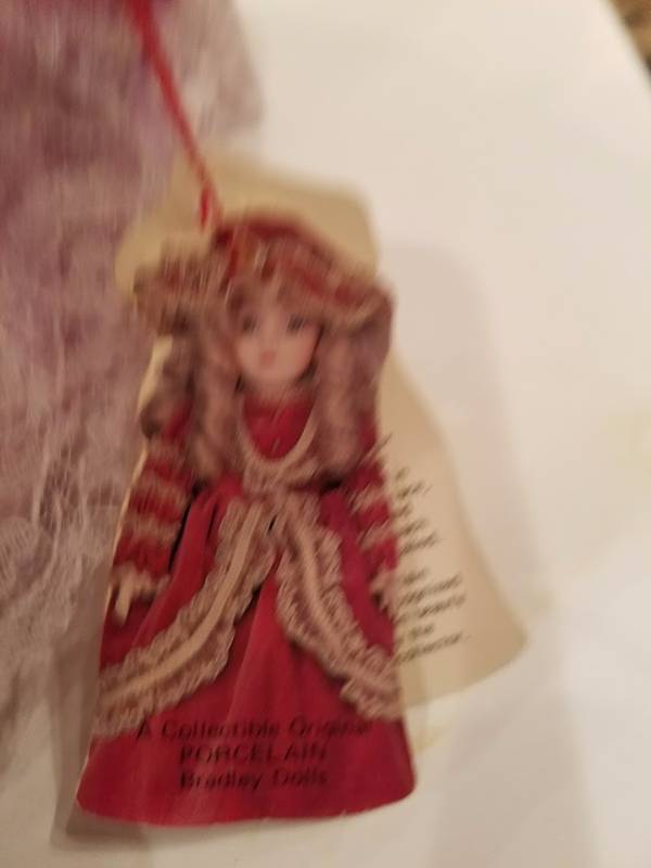 lot 15 image: Hand Painted Porcelain Bisque Doll