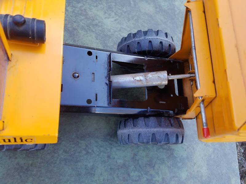 lot 54 image: Tonka,Off Colored Dump Truck