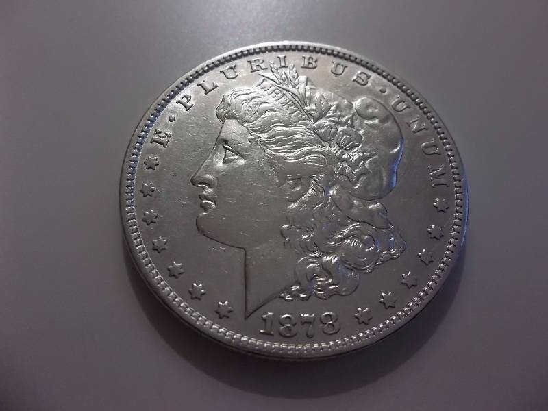 1878  Morgan Silver Dollar High Grade (In AU Valued At $80.00)