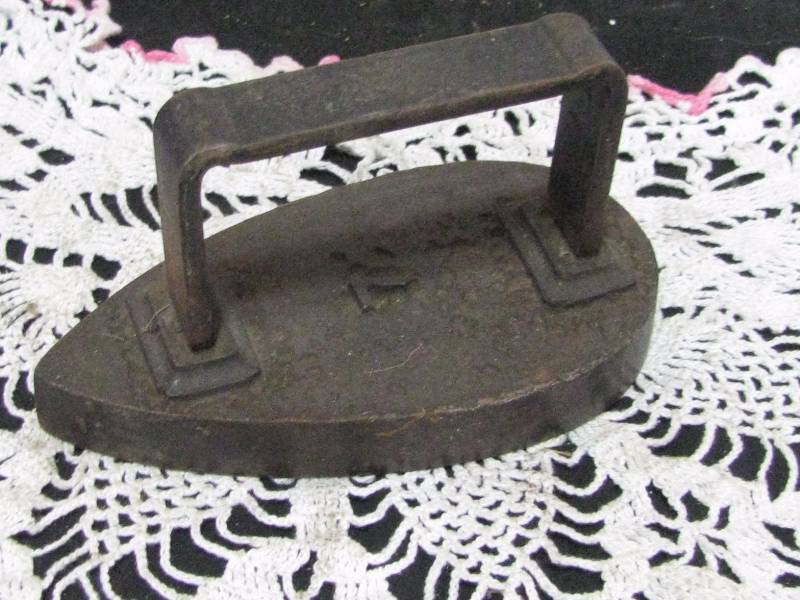 lot 60 image: Antique Sad Iron