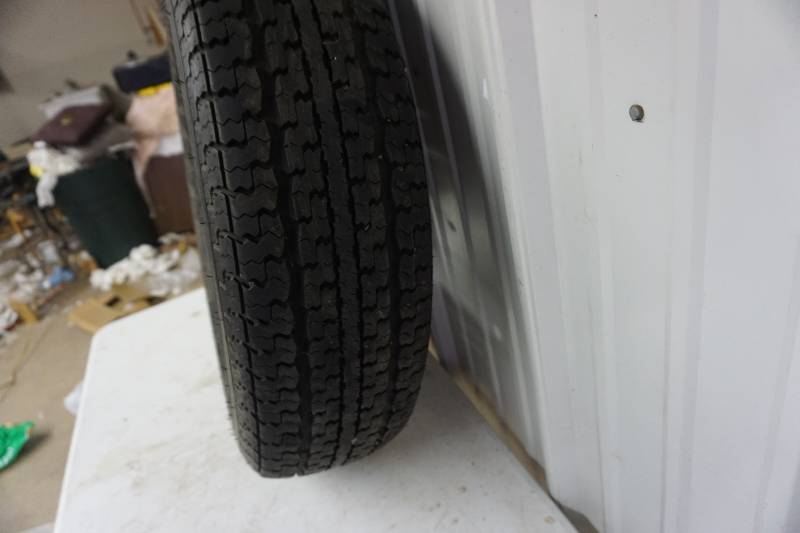 lot 61 image: Goodyear Marathon ST Tire With Rim
