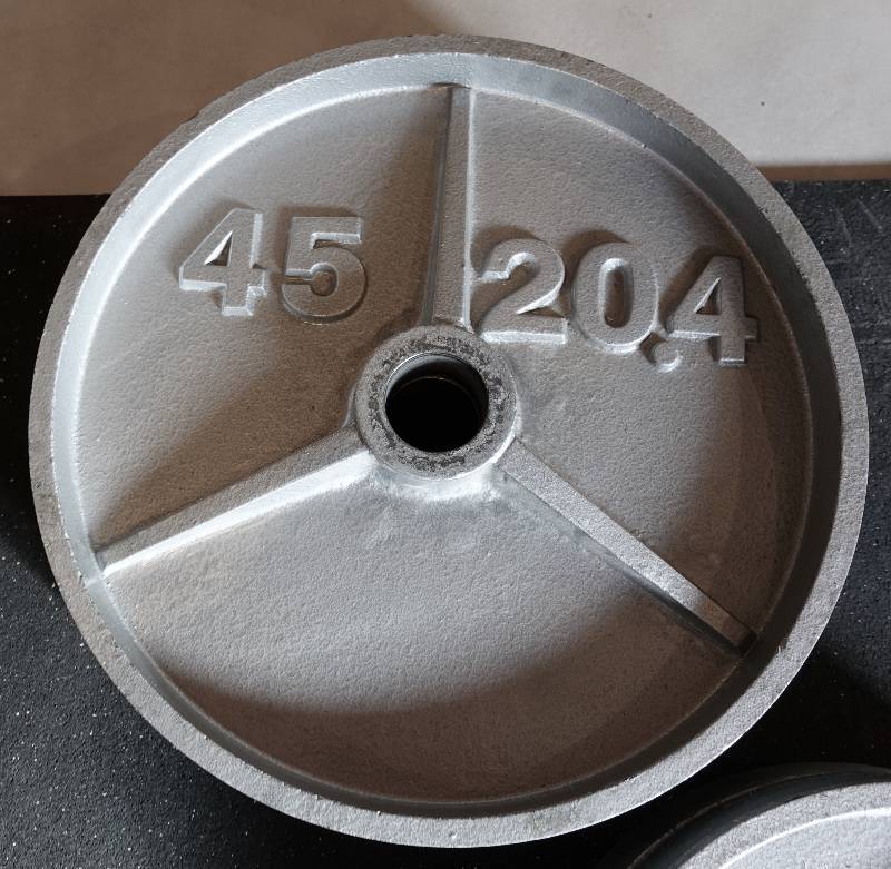 lot 4 image: Complete Set of Silver Cast Iron Olympic Weight Plates (245 lbs. total)