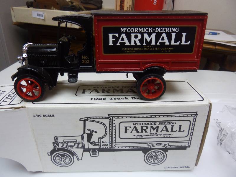 lot 187 image: ERTL McCormick Deering Farmall Die Cast Metal Bank