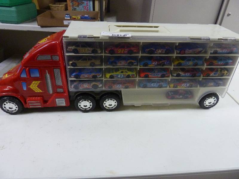 lot 281 image: Large Truck Full of Die Cast Race Cars