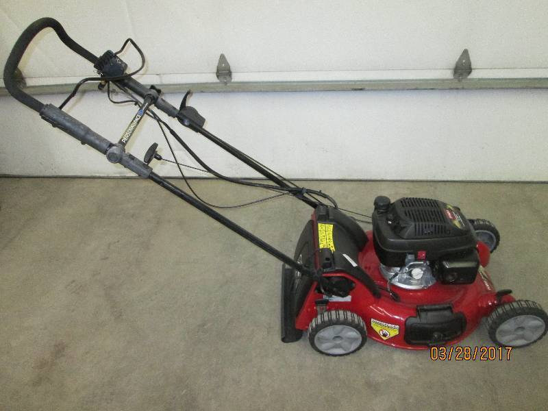 lot 7 image: Toro Personal Pace Lawn Mower