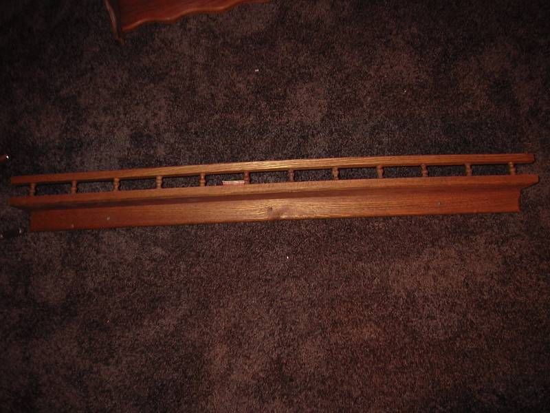 lot 32 image: 3 wood wall shelves 1- 24 long and 2 are 48 long