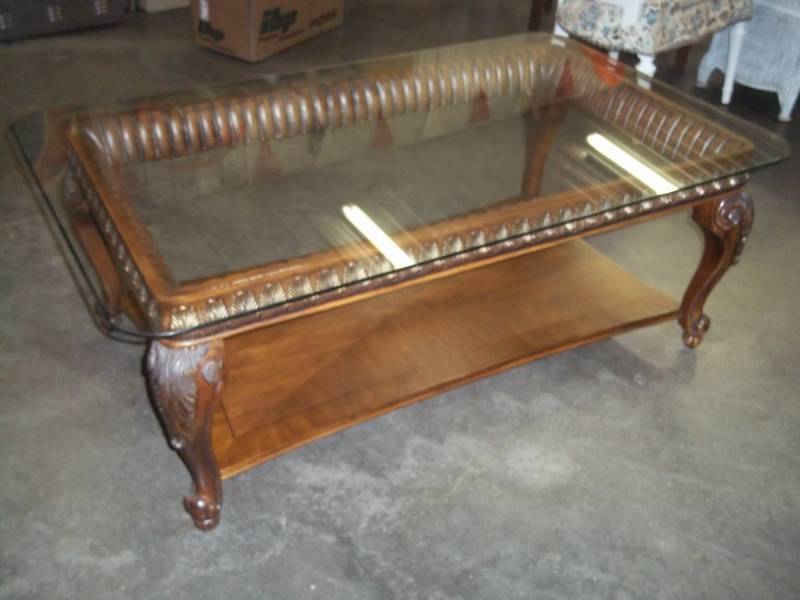 Glass top coffee table 52x 32