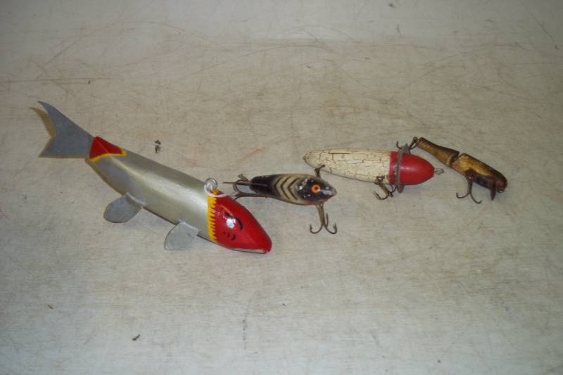 Vintage Muskie decoy and 3 vintage lures