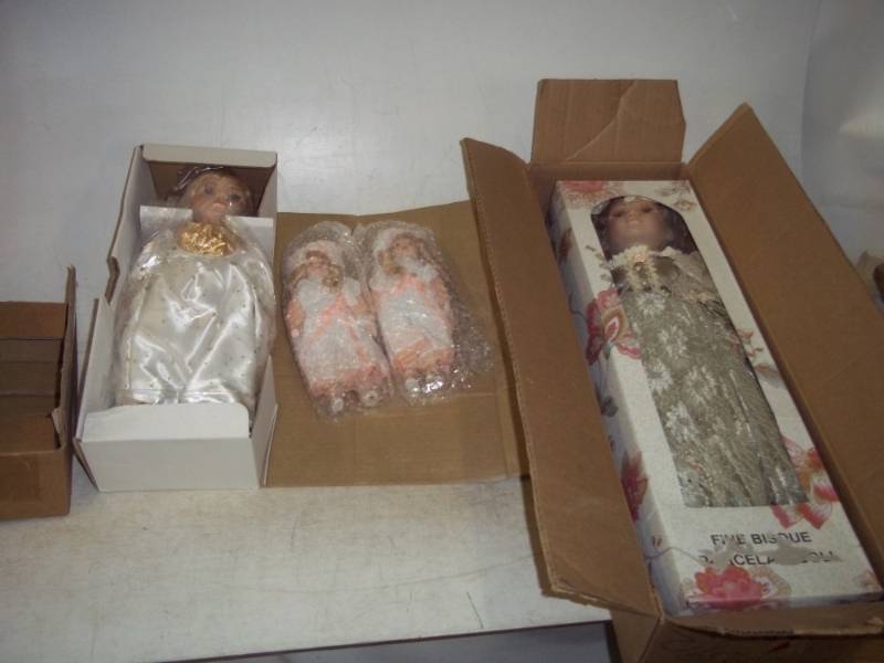 4 Porcelain dolls