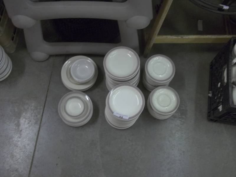 lot 52 image: 82 Salad plates and 4 white salad plates and 5 dressing bowls