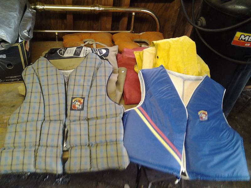 2-Stearns Life Vests, 2-Old Life Jackets, 2-Canvas Air Mattresses, 2 Piece Rain Suit