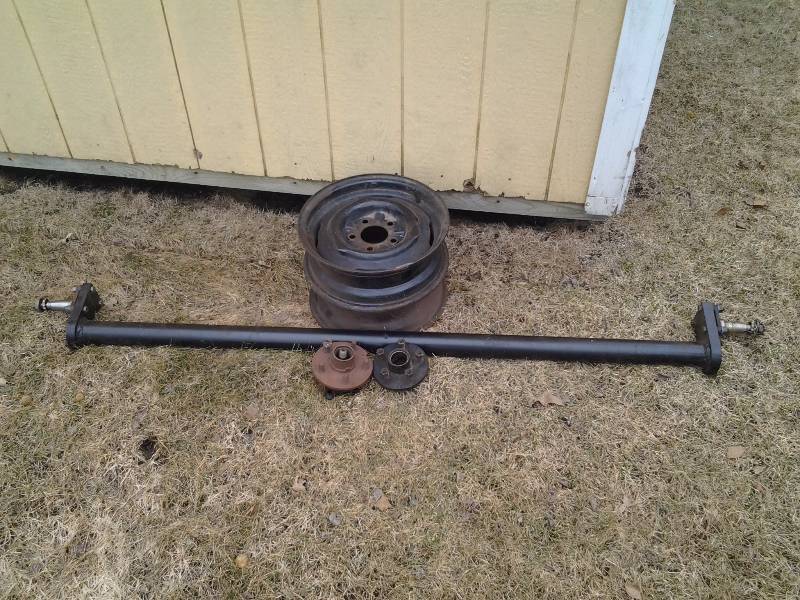 New Trailer Axle, Pair Hubs, Pair Wheels (May Not All Be Compatible) 63 Inches
