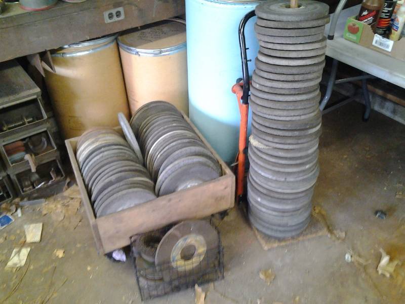Large Lot Of Grinding Wheels Includes 4 Wheels, 2-Dollys