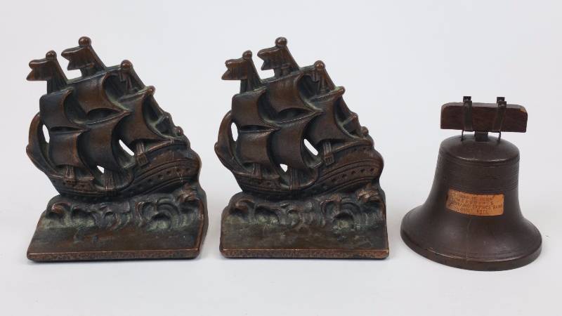 lot 94 image: 1920s Verona Cast Copper () Ship Bookends  1919 Coin Bank