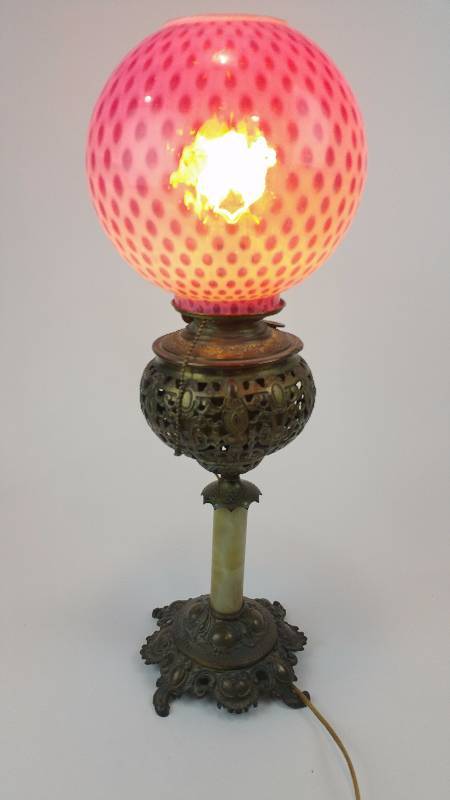lot 5 image: Art Nouveau Cast Iron Fenton Cranberry Globe Table Lamp
