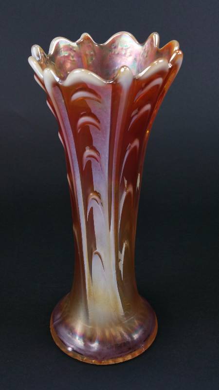 lot 48 image: Dugan Pulled Loop 9 12 Peach Opal Carnival Glass Vase