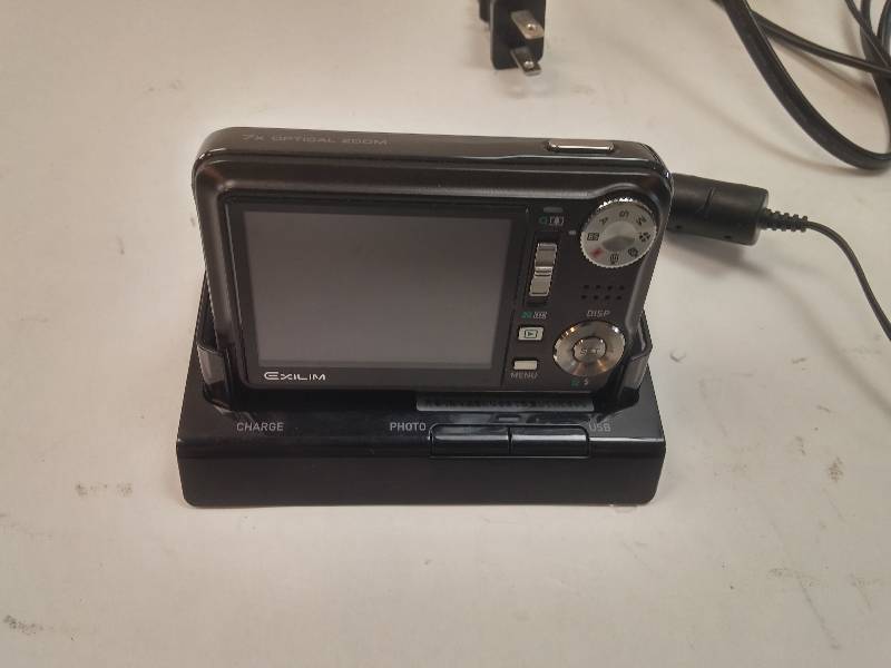 lot 454 image: Casio Exilim EX-V8 8MP Digital Camera with 7x Anti-Shake Optical Zoom with Dock GOOD WORKING CONDITION