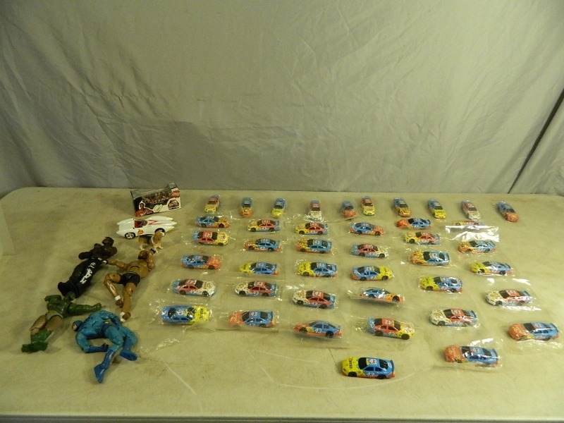 lot 32 image: Cars, Action Figures, and More