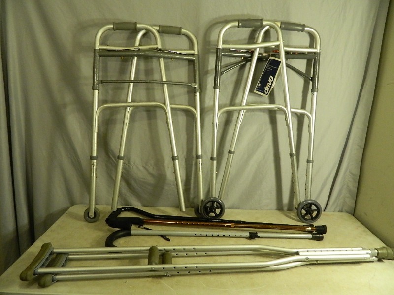 lot 89 image: 2 Folding Walkers, Crutches, and 3 Canes