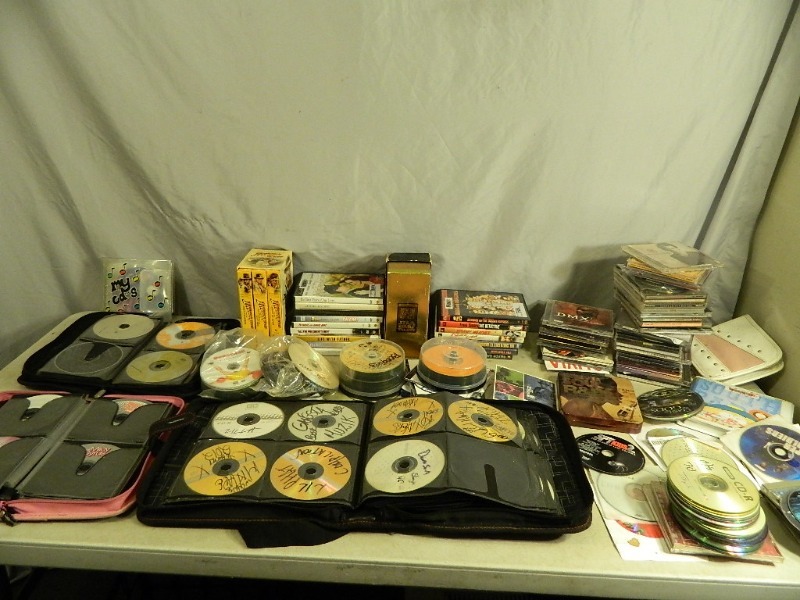 lot 100 image: HUGE Lot of CDs, Dvds, and More
