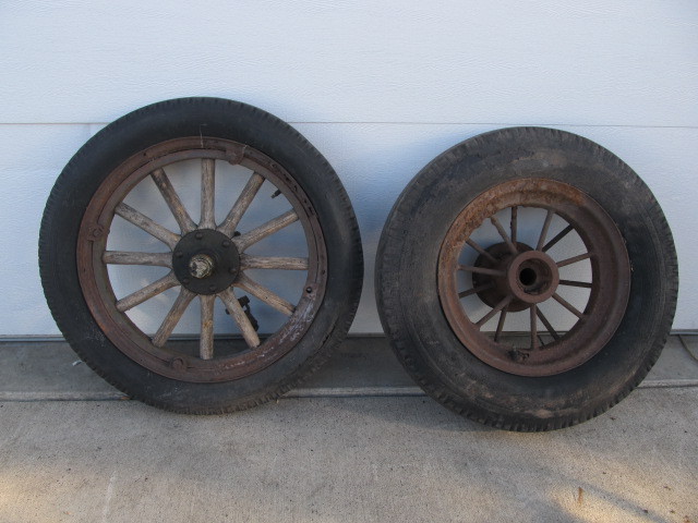 lot 13 image: 2 Antique Tires - 1 Wood Rim, 1 Ford