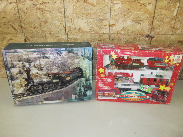 lot 7 image: 2 NIB Holiday Train Sets