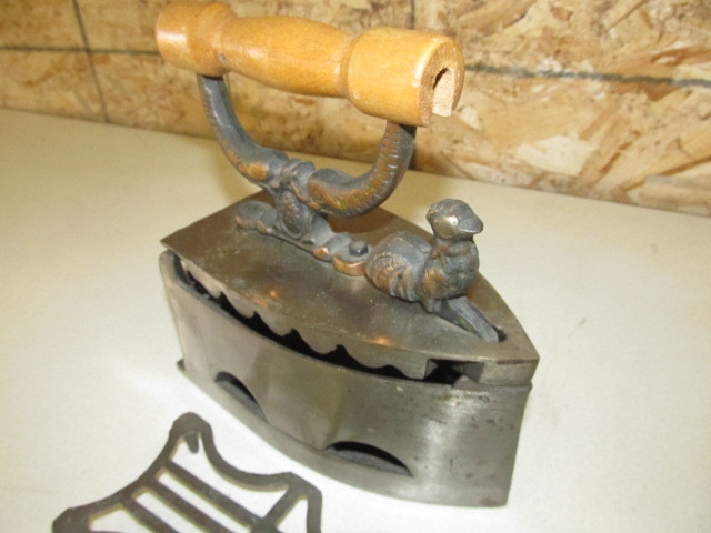lot 25 image: Unusual Vintage Figural Iron & Trivet