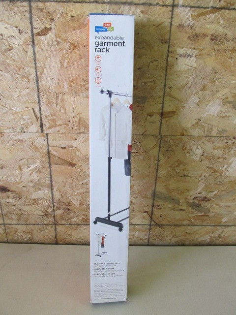 lot 39 image: NIB Rolling Clothes Rack
