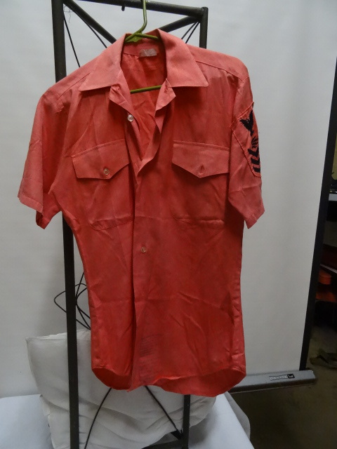 Mans Navy shirt died bright pink. S...