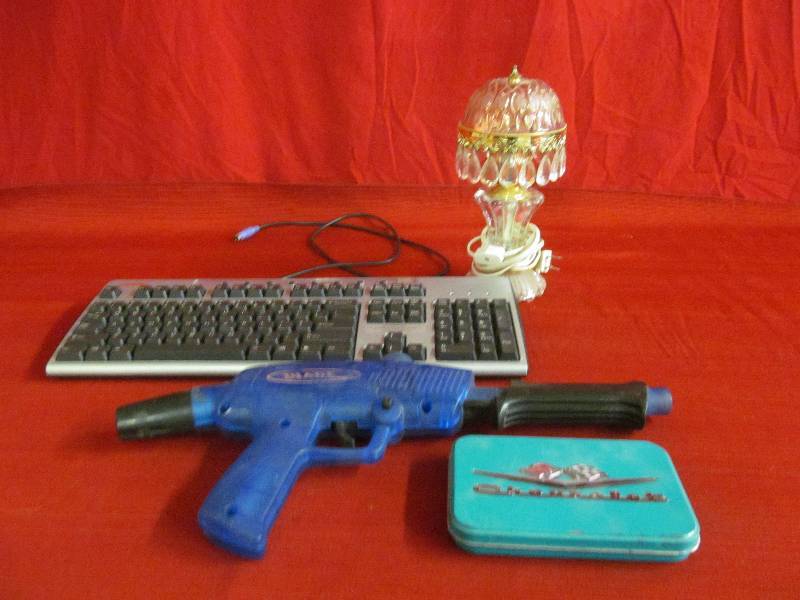 tin, Compaq keyboard, paintball gun