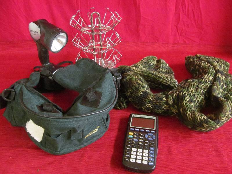 Texas Instruments clclulator,wire lazy susan, Hitachi flashlight