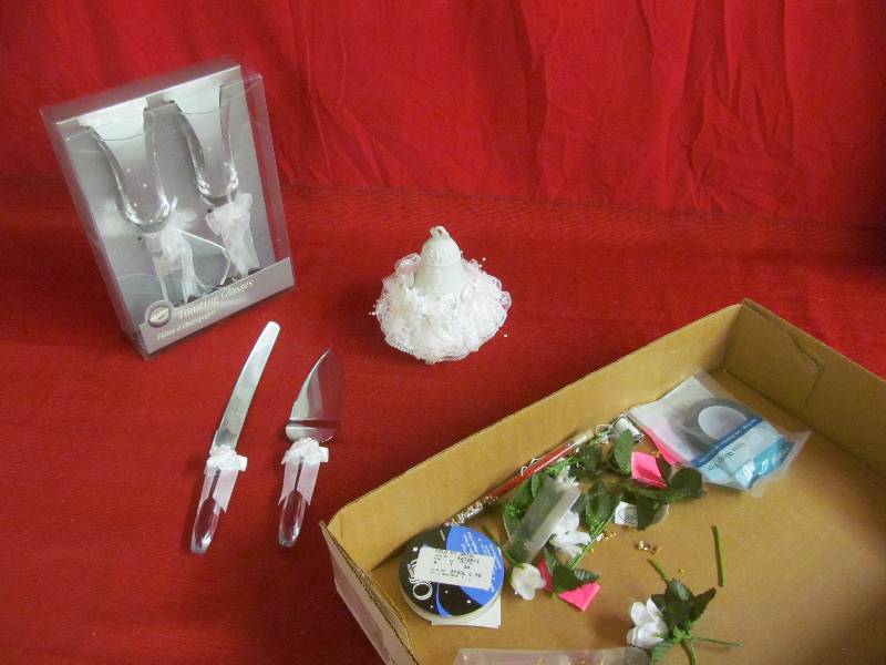 wedding cake topper toasting glasses cake knives