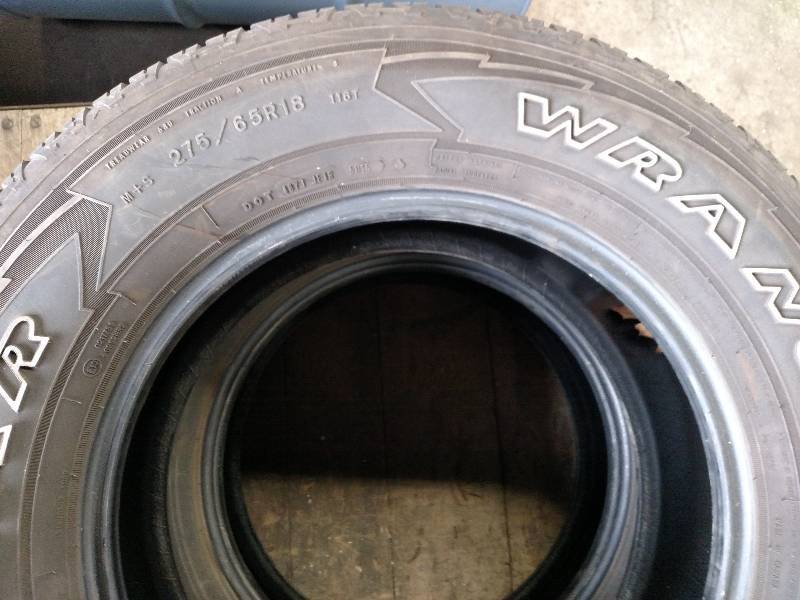 lot 119 image: (4) Takeoffs of Goodyear Wrangler ...